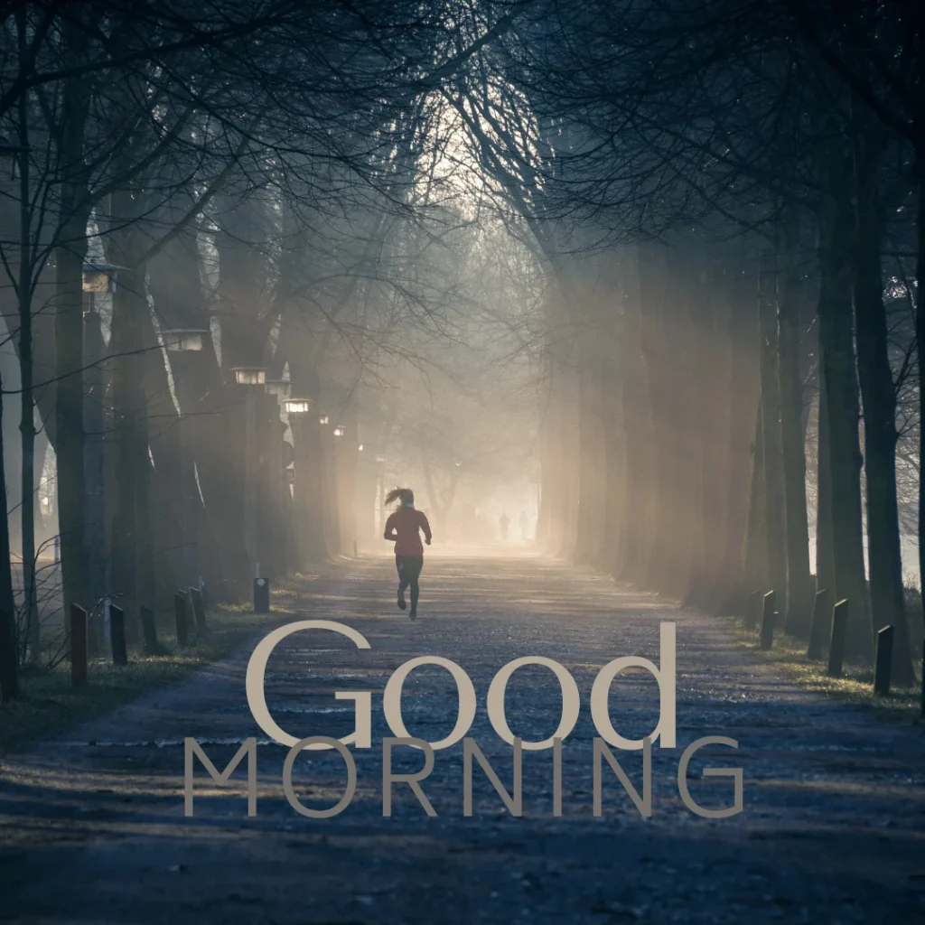 A girl jogging in the morning on road surrounded by long trees.png