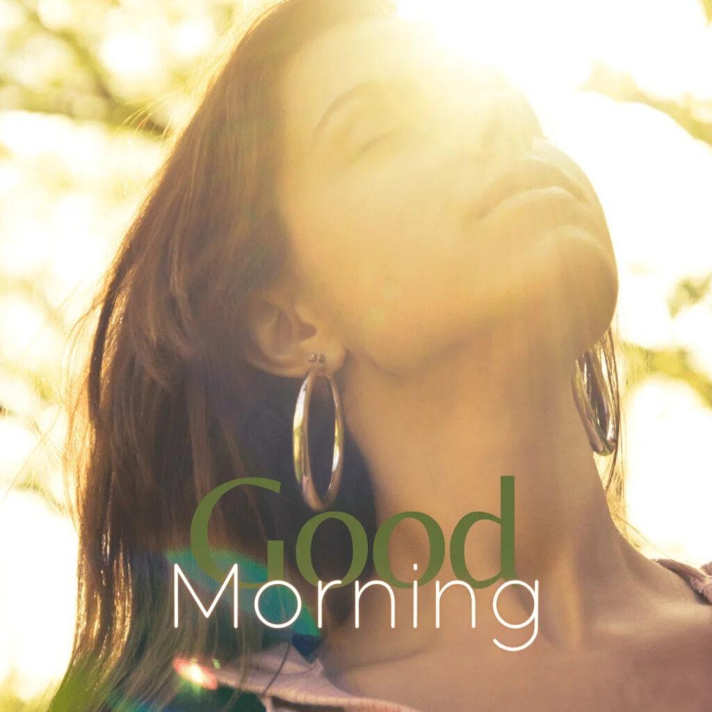 Girl relaxing with bright sun rays in the early sunrise morning.png