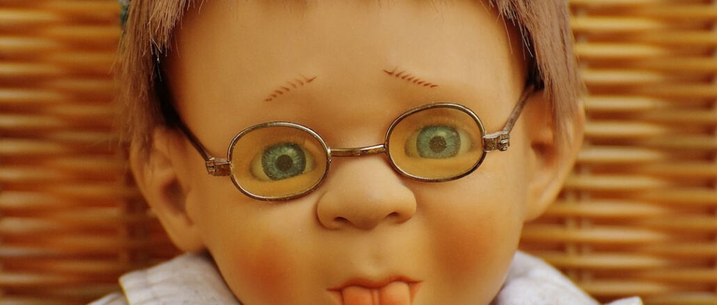 Doll Wearing Eyeglasses