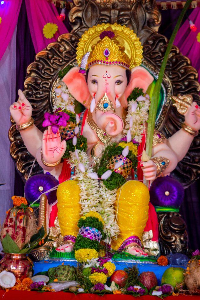 Fruit Offerings under a Ganesh Statue-min