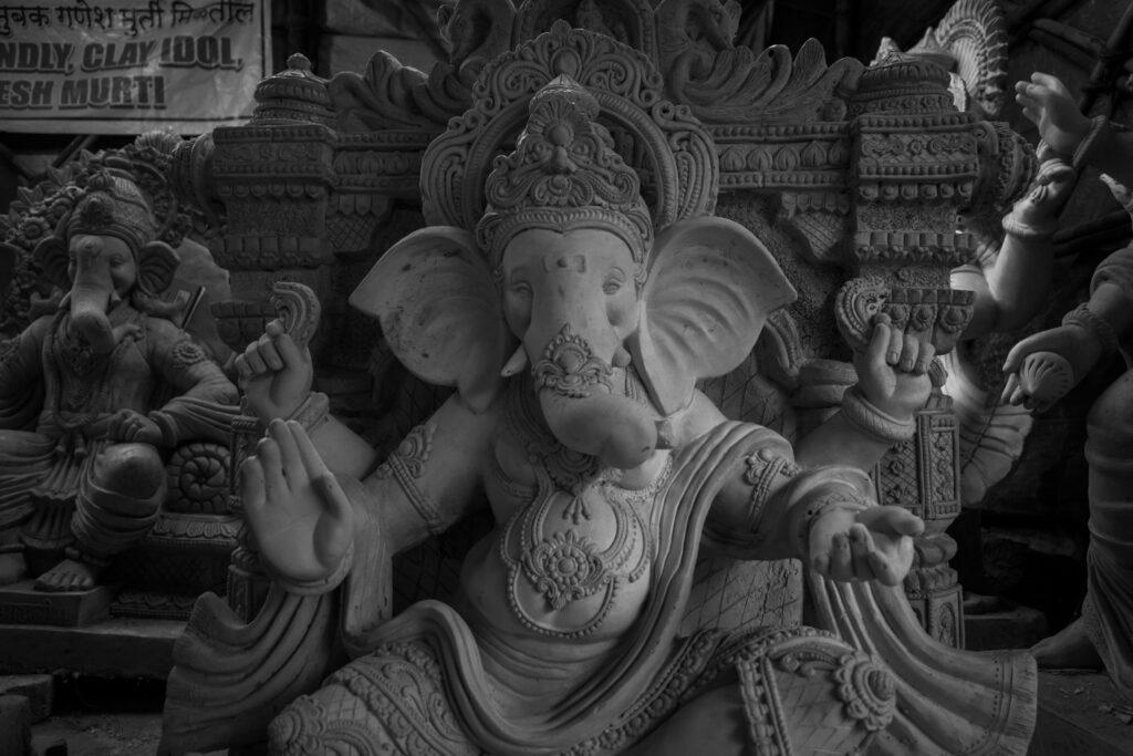 Grayscale Photo of Ganesha Statues min