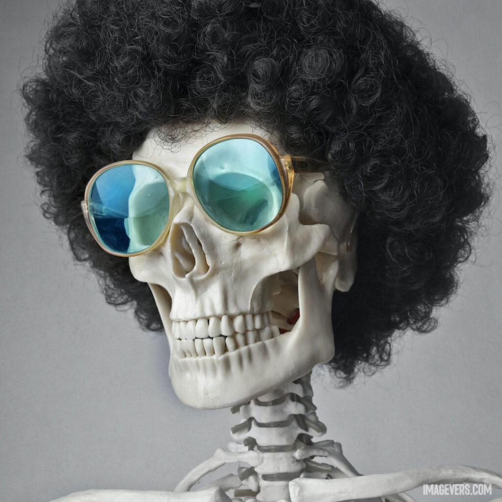 Portrait-Photo-of-a-Skeleton-in-Sunglasses-and-Wig